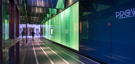 Wilder Walk, a new alley near Piccadilly Circus featuring light installation encased within layered glass panels along the sides of the alley, Soho, L