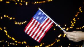 USA flag, red white and blue with sparkling yellow bokeh background, Copy space, space for text. colorful design American concept
