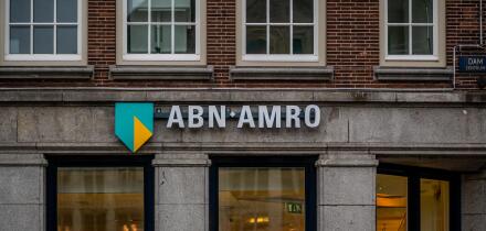 Amsterdam, Netherlands - August 26, 2018: Brand name logo ABN AMRO bank on local branch office in Amsterdam
