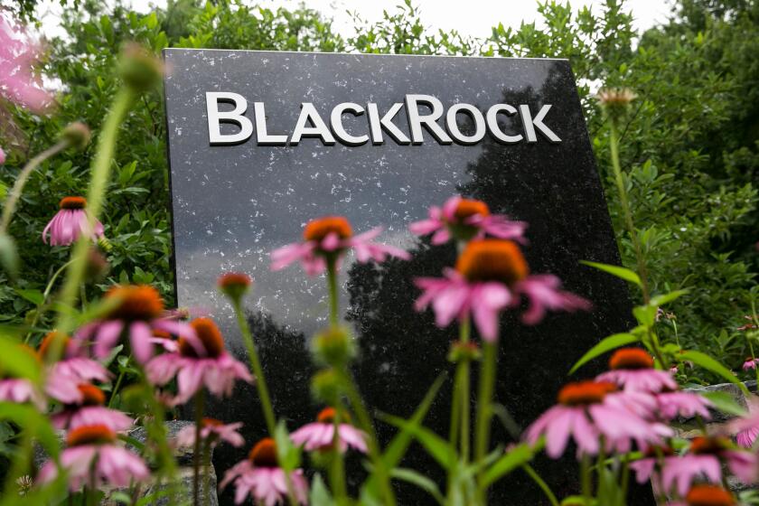 A logo sign outside of a facility occupied by BlackRock, Inc., in Wilmington, Delaware.