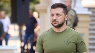 Kyiv, Ukraine. 07 August, 2022. Ukrainian President Volodymyr Zelenskyy, right, during a ceremony awarding "Golden Star" orders to soldiers and family members awarded as Hero of Ukraine on Air Force Day in the courtyard of the Mariyinsky Palace, August 7,