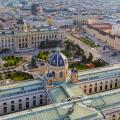 A magnificent aerial shot of Vienna?s MuseumsQuartier, featuring the Kunsthistorisches Museum and lush gardens, showcasing architectural brilliance an