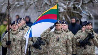 Members of the Lithuania's Army attend a ceremony marking the 106th anniversary of the Lithuanian military on Armed Forces Day in Vilnius, Lithuania, Saturday, Nov. 23, 2024. (AP Photo/Mindaugas Kulbis)