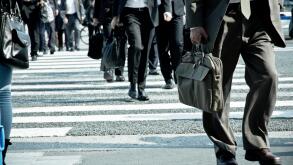Low Section Of Business People Walking On Road
