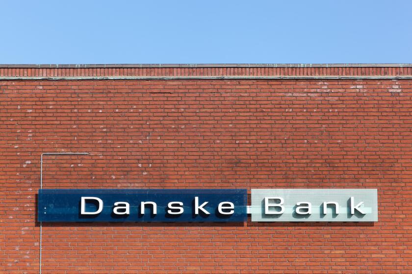 Odense, Denmark - April 9, 2017: Danske bank logo on a wall. Danske bank is the largest bank in Denmark and a major retail bank in the northern Europe