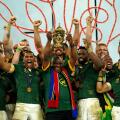 South African President Cyril Ramaphosa lifts the Webb Ellis Cup with the South Africa players following victory in the Rugby World Cup 2023 final match at the Stade de France in Paris, France. Picture date: Saturday October 28, 2023.