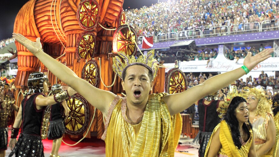 A man in costume celebrating at the Carnival in Rio de Janeiro, Brazil on Monday, 11 February 2013.