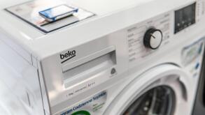 Lodz, Poland, July 2018 inside Saturn electronic store, free-standing Beko washing machine on display, produced by Beko, Turkish brand of Arcelik