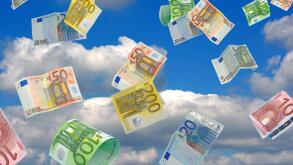 Flying banknotes on the sky
