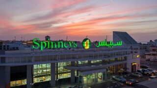 A branch of Spinney's supermarket in the Jumeirah 1 district of Dubai at dusk, UAE