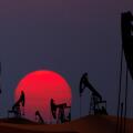Oil pumps silhouette at  sunset