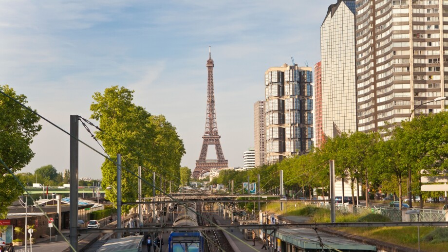 France, Paris, Train Station with High-rise Buildings on the Left Bank and Eiffel Tower