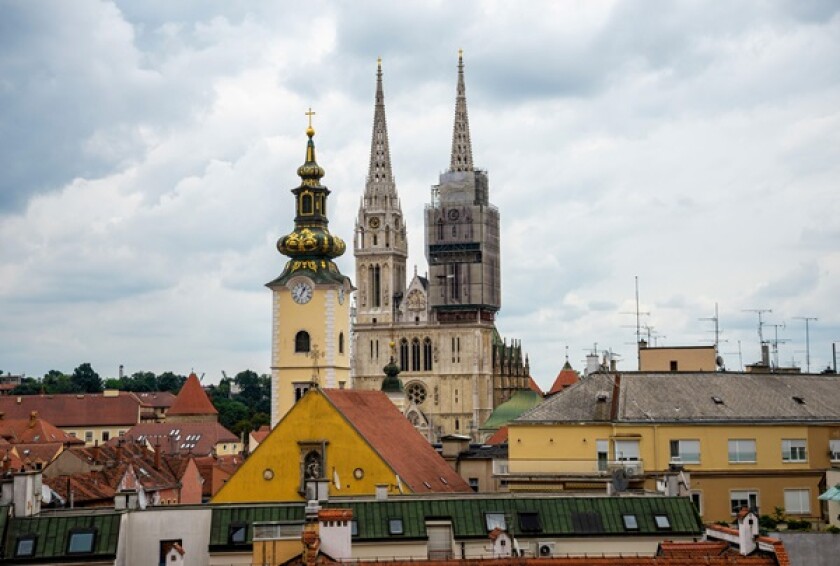 Historical Cathedral of Zagreb and City Rooftops Under a Cloudy Sky, Zagreb, Croatia, June 2019