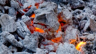 Charcoal embers ready for grilling