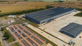 Aerial view of the Tritax Symmetry development at Symmetry Park, Biggleswade for the new portal framed regional distribution centre of the Co-op food group.
This steel-framed building covers 661,000 sq ft, 357 metres long, 144 metres wide, there are is al
