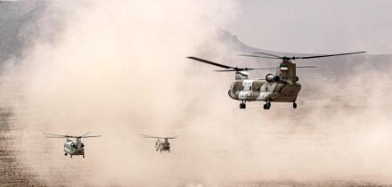 In this photo released by the Iranian army on Saturday, Oct. 28, 2023, helicopters fly during a drill in central Iran. (Iranian Army via AP)