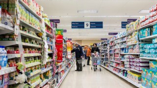 Shoppers in a Tesco supermarket, UK