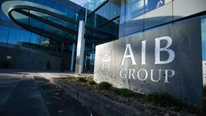 Dublin, Ireland. 03rd Dec, 2018. The lettering of the Irish commercial bank AIB (Allied Irish Banks) can be seen next to the entrance to the bank's head office. Credit: Christian Charisius/dpa/Alamy Live News