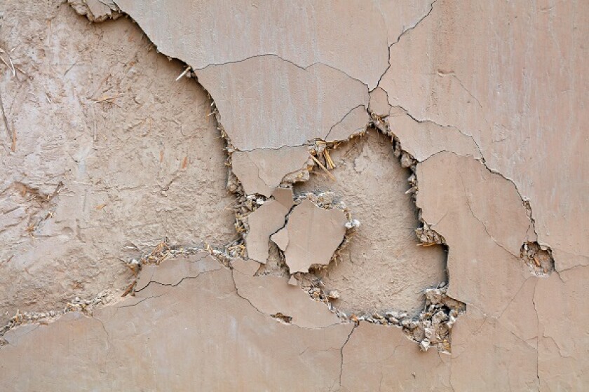 Broken earth wall