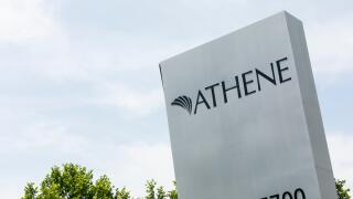 A logo sign outside of a facility occupied by Athene Holding in West Des Moines, Iowa, on June 30, 2018.