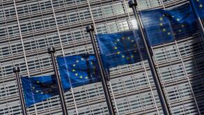 Flags of European Union weaving outside the European Commission building, Brussels, Belgium