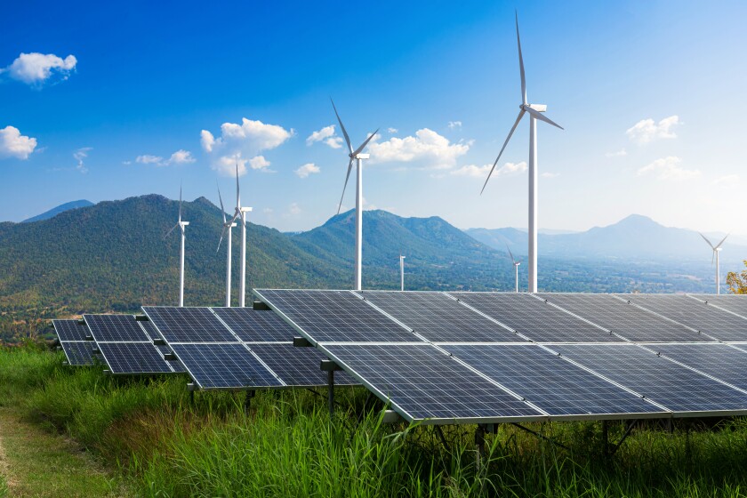 Photovoltaic modules solar power plant with wind turbines -adobe