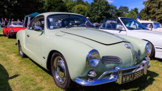 1971 Volkswagen Karmann Ghia at a classic car show in the Gnoll Country Park, Neath Port Talbot, Wales, UK