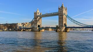 Tower Bridge against the winter blue sky. The bascule and suspension bridge crosses the River Thames and has become an iconic symbol of London.
