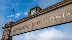 large sign gantry across the entrance to Southampton docks UK, Associated British ports sign above docks gate in Southampton.