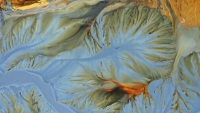 Aerial view of copper mining residuals in decanting lake by drone