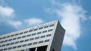 UTRECHT / NETHERLANDS - APRIL 15, 2019: DE VOLKSBANK sign at building exterior against a blue sky