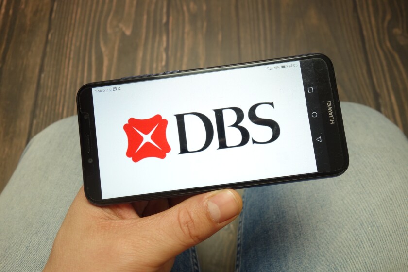 DBS Bank logo displayed on smartphone-adobe-2021