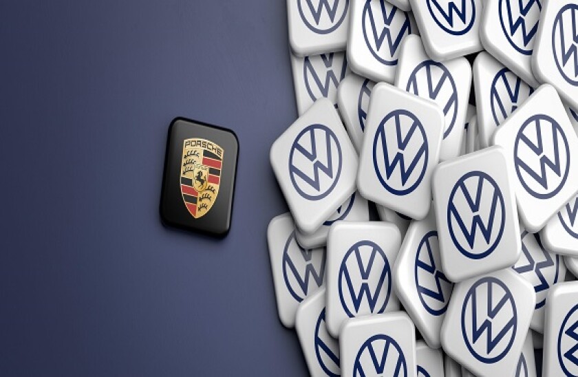 Volkswagen spinning off the Porsche brand by going public. Logos of the German mass car manufacturer Volkswagen VW and a logo of Porsche.