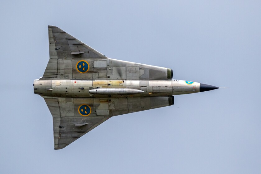 VOLKEL, NETHERLANDS - JUN 15, 2019: Vintage former Swedish Air Force Saab Draken fighter jet plane performing a fly-by at the Dutch Air Force Days.