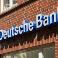 Stade, Germany - May 28, 2020: Signage on brick wall at Deutsche Bank branch . Deutsche Bank is a global Multinational Investment bank and financial s