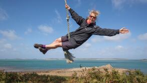 Woman on Rope Swing; St Mary's; Isles of Scilly; UK