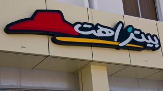 Pizza hut logo in arabic language Oman