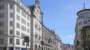 Piccadilly, London, UK. View east towards Piccadilly Circus from junction with Swallow Street (left)