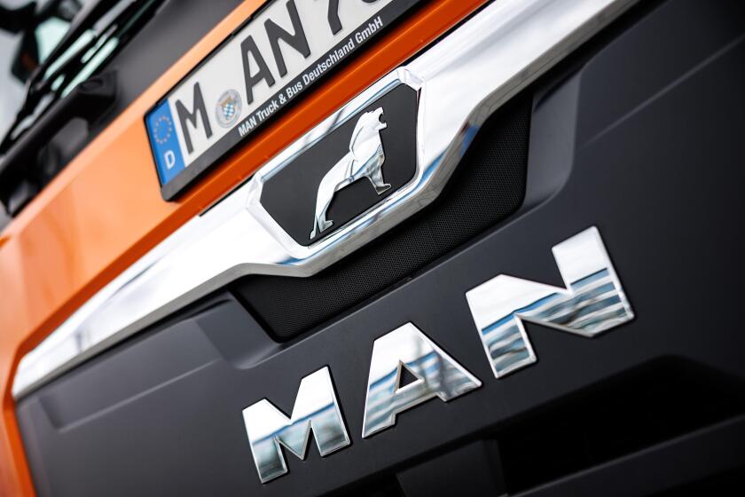 20 March 2023, Bavaria, Munich: The MAN Truck & Bus SE logo can be seen on the front of a MAN Truck & Bus SE vehicle. MAN is part of the TRATON GROUP, one of the world's leading commercial vehicle manufacturers. MAN Truck & Bus SE focuses on the developme