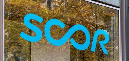 Sign and logo on Scor's headquarters, Paris, France. Scor SE is a French reinsurance and asset management group, one of the world's leading reinsurers