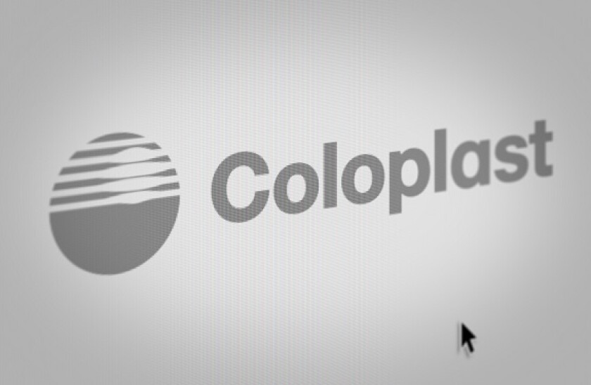 Logo of the public company Coloplast displayed on a computer screen in close-up. Credit: PIXDUCE