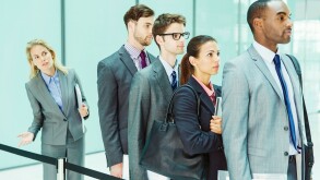 Business people waiting in line
