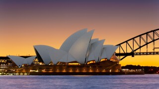 Sydney Opera House with Sydney Harbor Bridge, Sydney Harbour Bridge at sunset. Sydney Australia New South Wales.