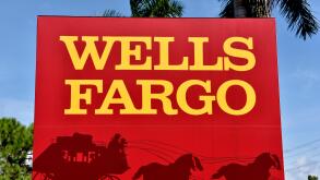 Wells Fargo Bank sign in front of palm trees