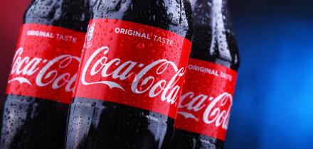 POZNAN, POLAND - NOV 29, 2018: Plastic bottles of Coca-Cola, a carbonated soft drink manufactured by The Coca-Cola Company headquartered in Atlanta, G