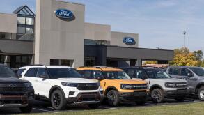Indianapolis - Circa October 2022: Ford Car, SUV and Pickup Truck dealership. Ford manufactures the F-150 and F-Series trucks, Mustang Mach-E and Esca