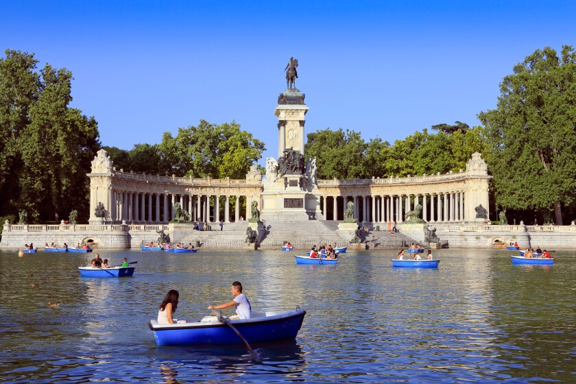 Summer boating on lake in Retiro Park, Madrid