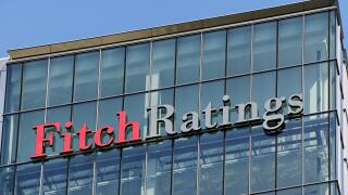 Fitch Ratings Sign on its Office Building, Canary Wharf, London, UK.