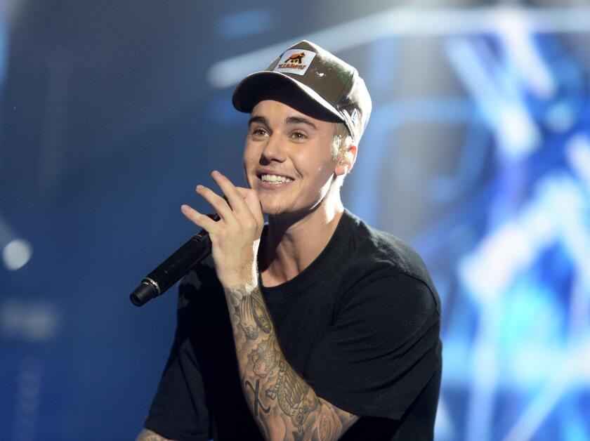 Justin Bieber performs on stage during the Capital FM Jingle Bell Ball 2015 held at The O2 Arena, London.
Photo credit should read: Doug Peters EMPICS Entertainment