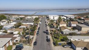 Aerial view of Imperial beach residential area and San Diego Bay on the background, San Diego, California, USA, North America